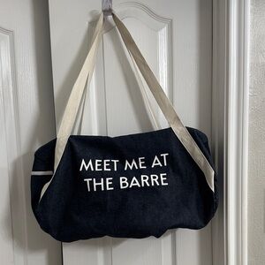 Elegant Black Canvas Travel Bag with Cream Straps